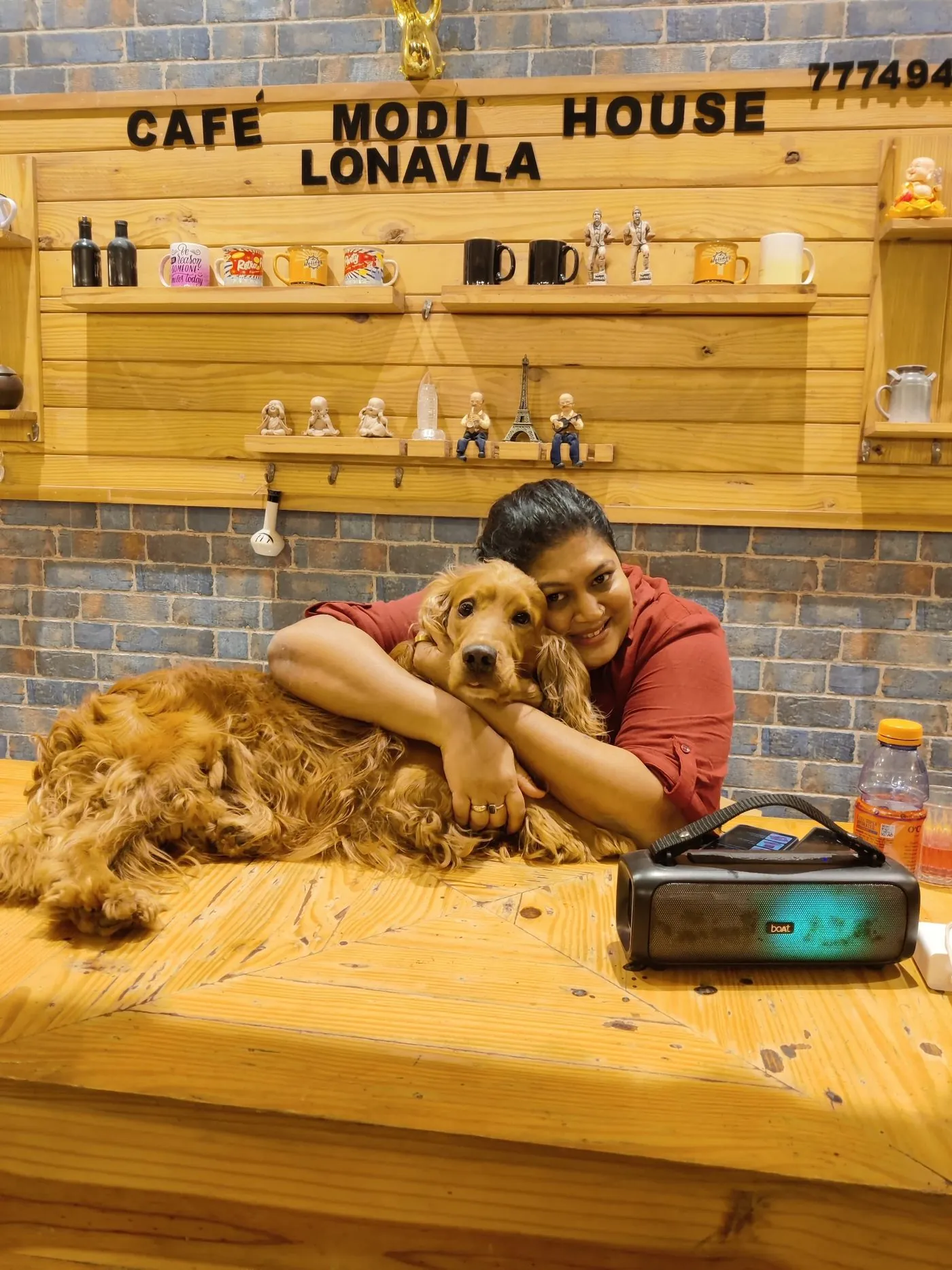 Mugdha and Simba at a café